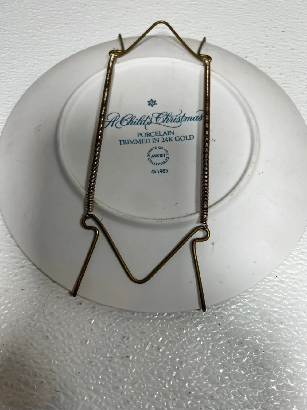 A child's Christmas , Porcelain trimmed 24K gold, A fine collectible AVON, 1985